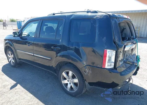 2014 Honda Pilot Touring z USA, uszkodzony, nr VIN 5FNYF3H97EB008210